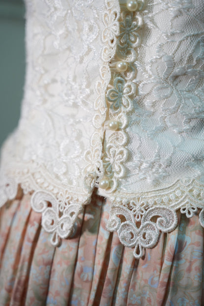 Heavy industry lace vest + light crushed floral skirt