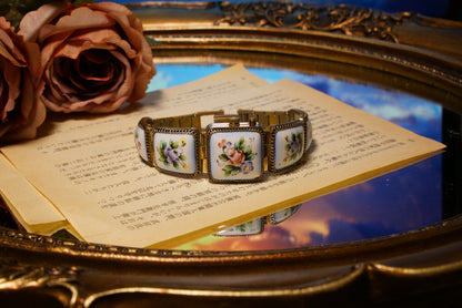 Russian-made, hand-painted floral mechanical watch.