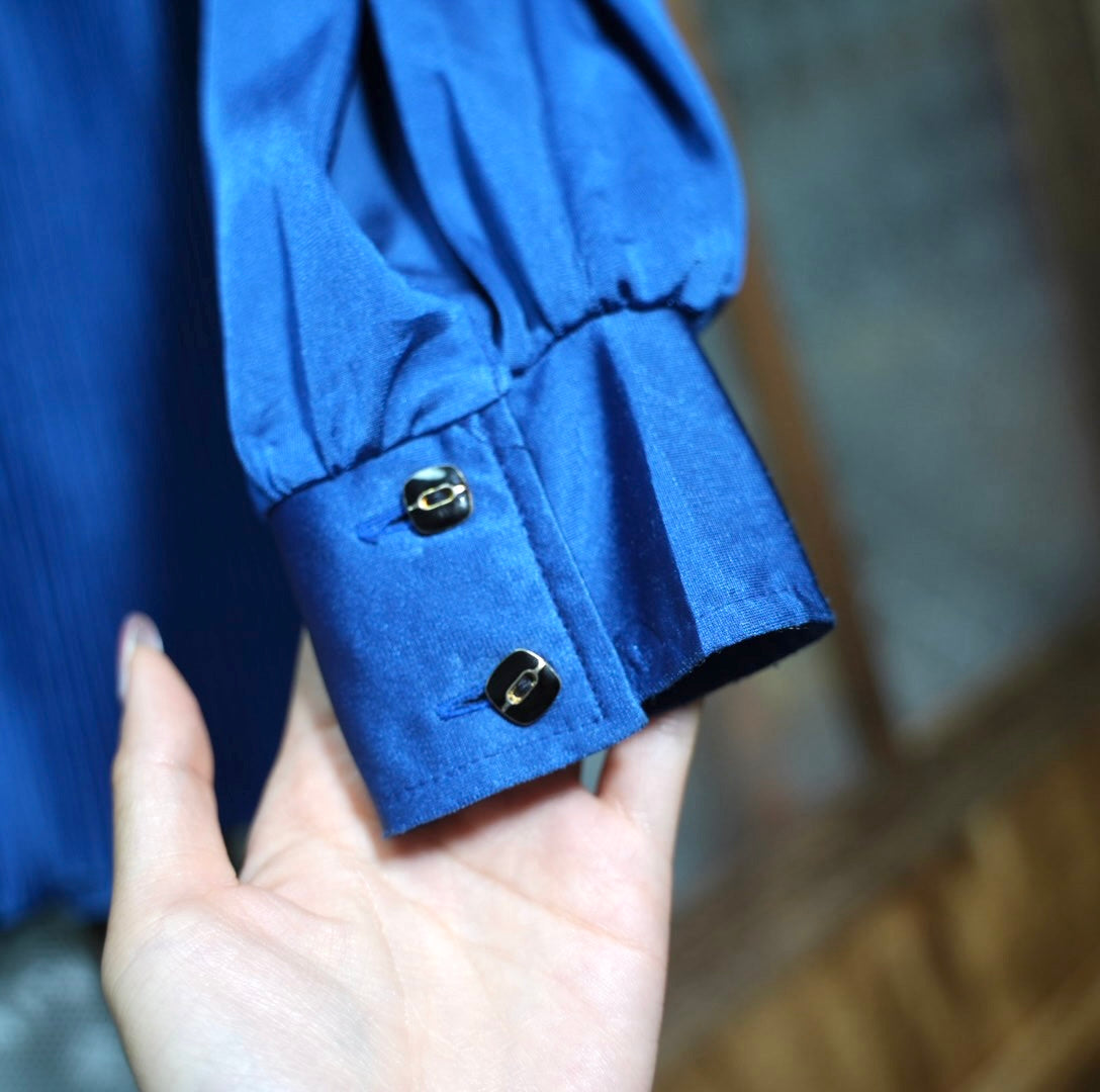 Dark blue bow pleated top