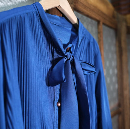 Dark blue bow pleated top